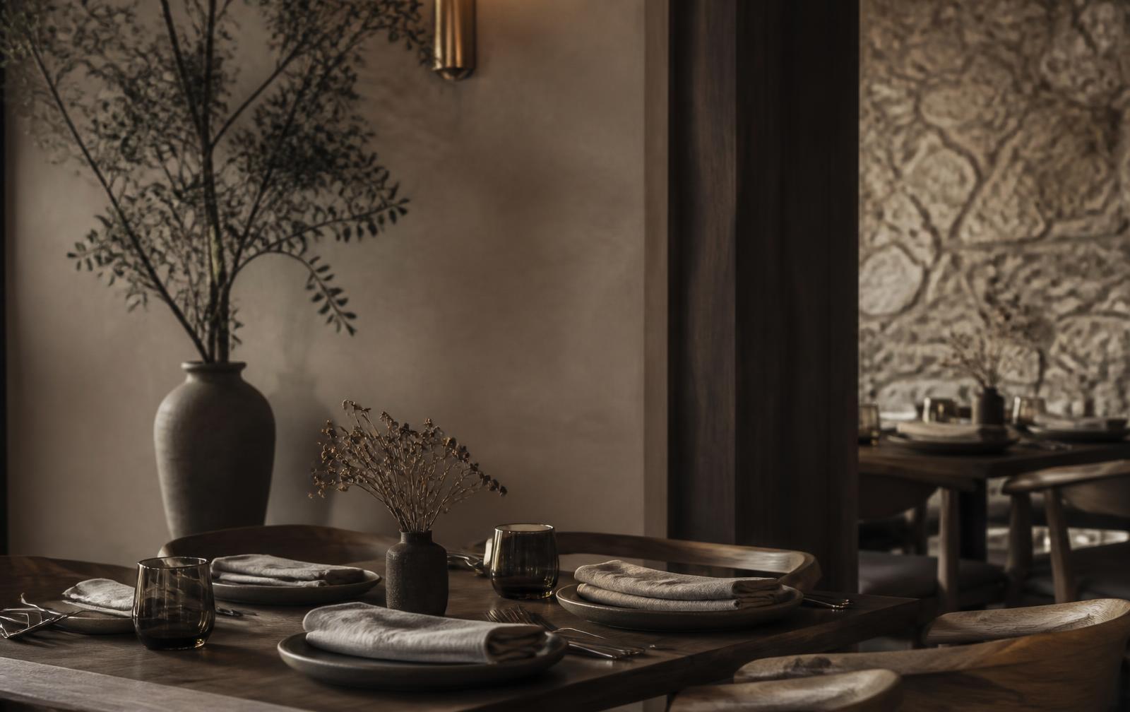 Warm restaurant interior with a set table